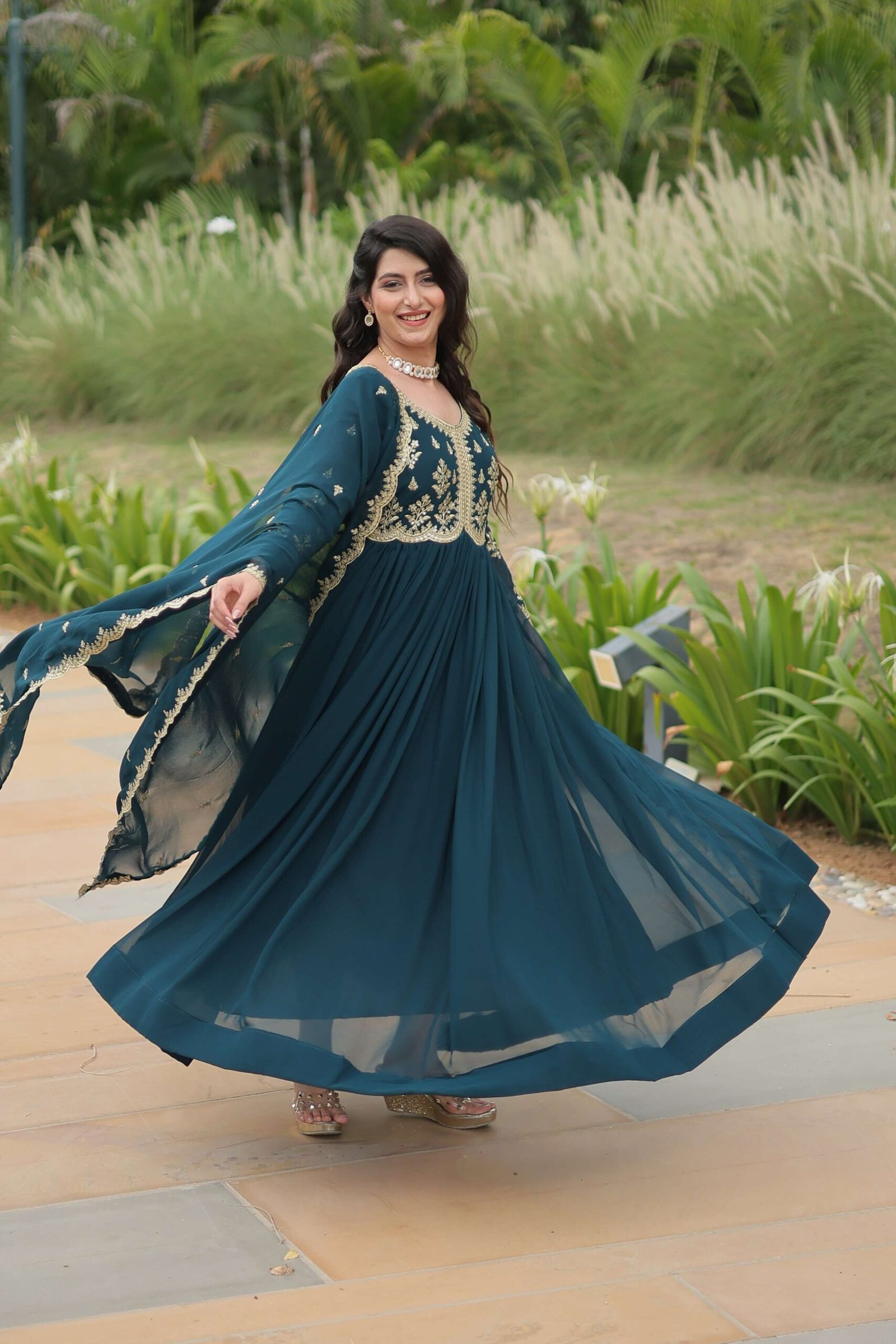 Teal-Blue Elegant Kutchi Gamthi Work Reyon Gown with Heavy Flair